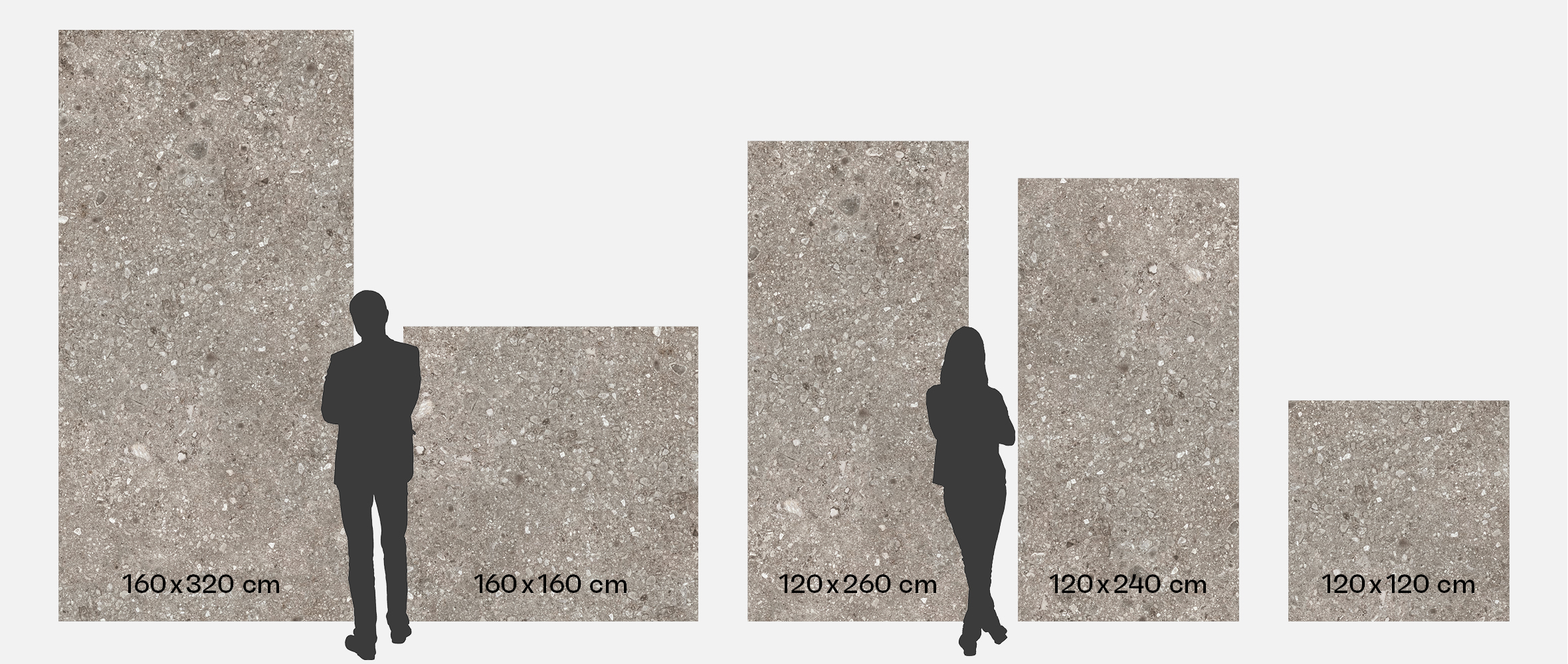Lattian ja seinän laatoitus isoilla laatoilla, isojen laattojen asennus, havainnekuva suurlaatan koko, betoni- ja kivikuosinen sisustus.